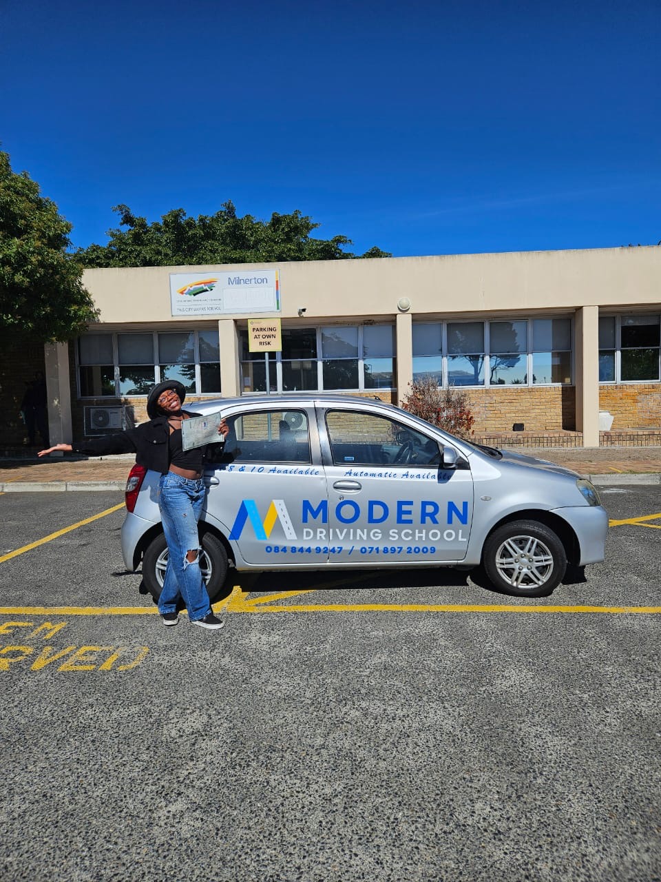 Modern Driving School learner celebrating their pass